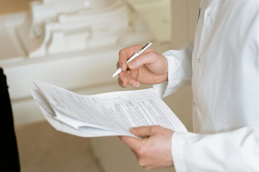 doctor checking the documents